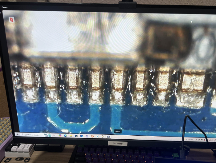 Soldering under microscope